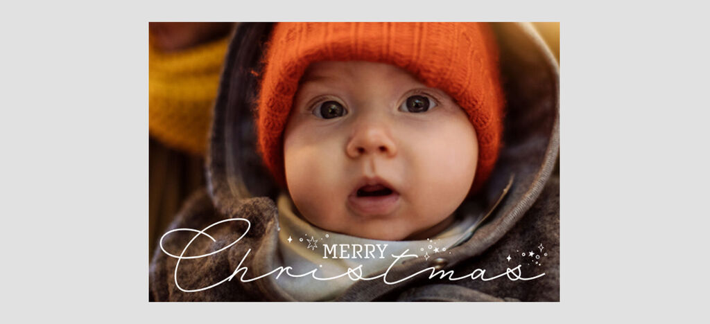 Une image de Noël chaleureuse avec le texte 'Joyeux Noël' en lettres festives.