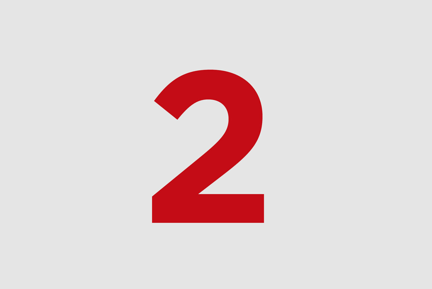 Grand chiffre rouge deux sur fond gris