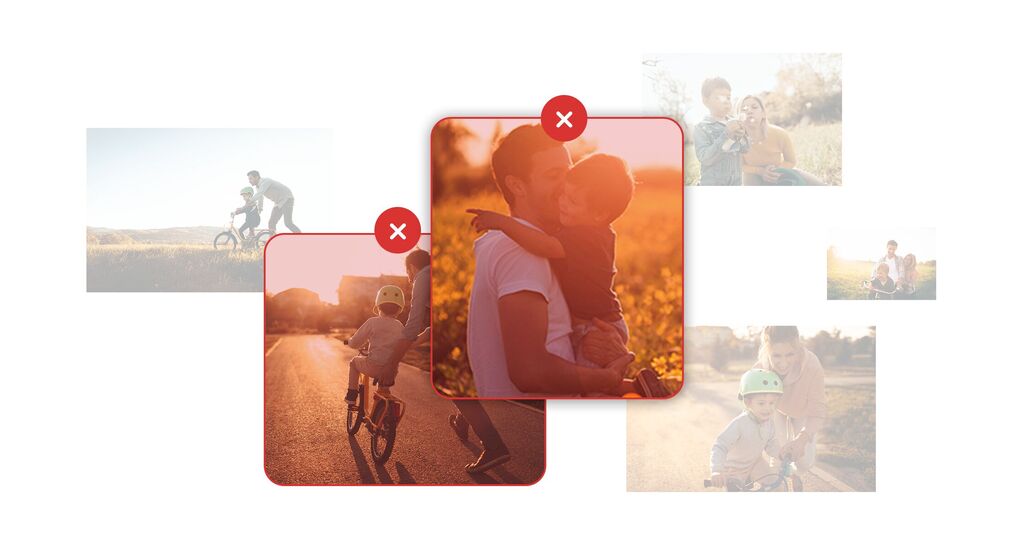 Un père heureux serre son enfant dans la lumière dorée du soir.