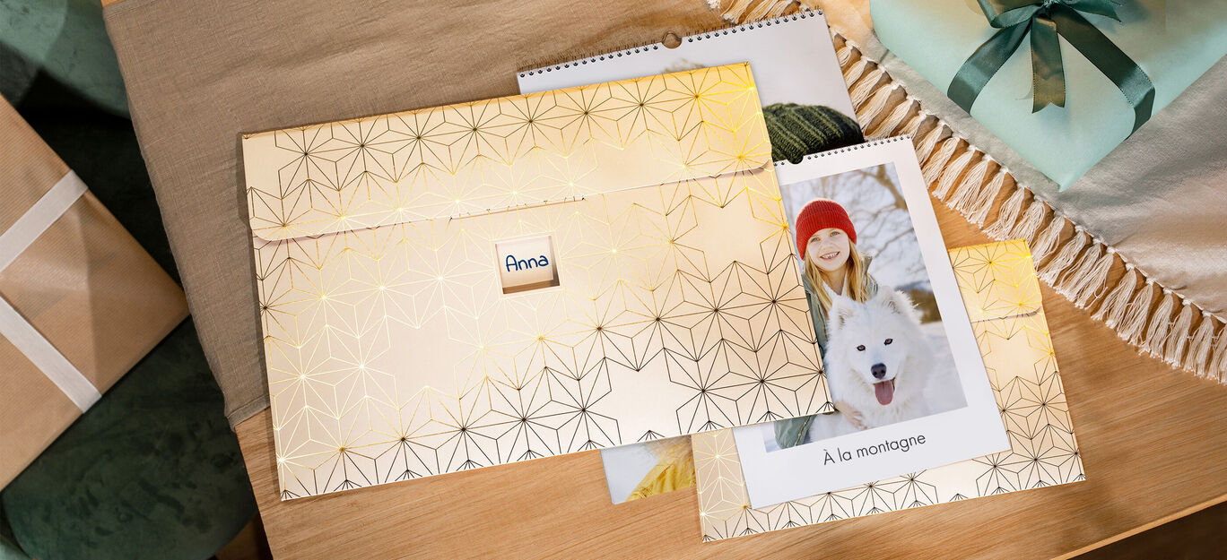 Un livre photo CEWE plein d'amour et un cadeau créatif dans une couverture élégante.