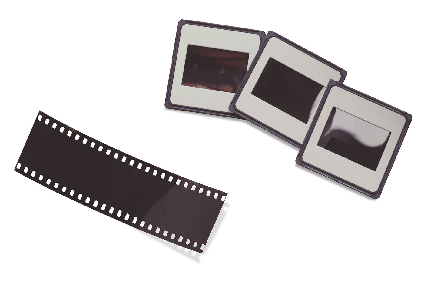 Trois cadres photo et un film, prêts pour des souvenirs passionnants