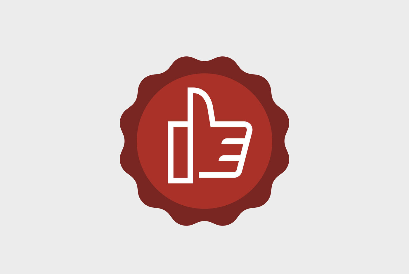 Un emblème rouge avec un symbole de pouce levé blanc, montrant la joie et le soutien positif