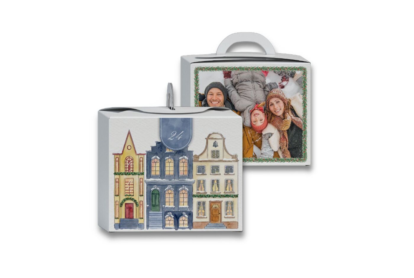 Boîte DIY avec village illustré et portrait d'une famille sur la neige