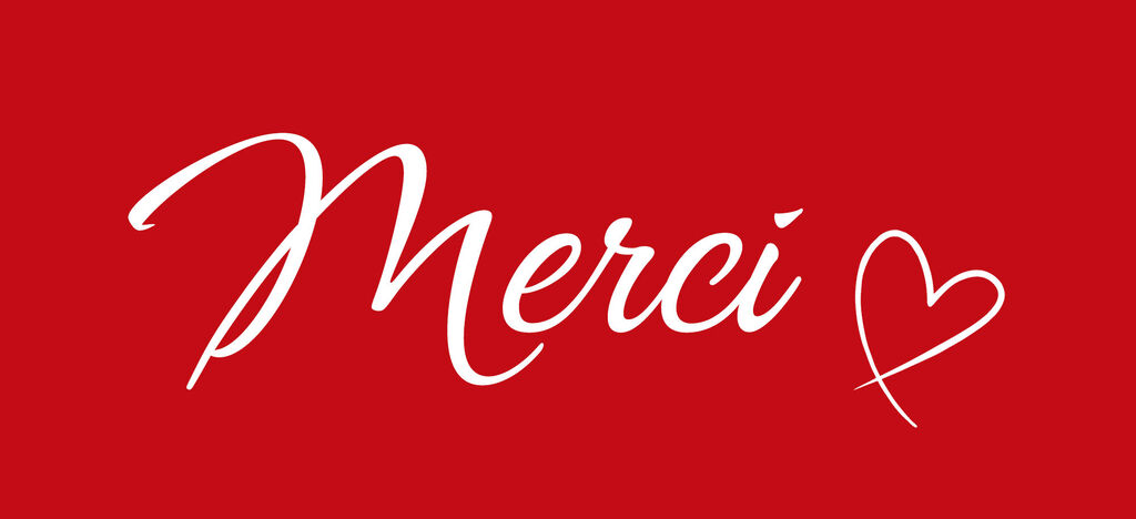 Le mot Merci sur fond rouge en écriture élégante