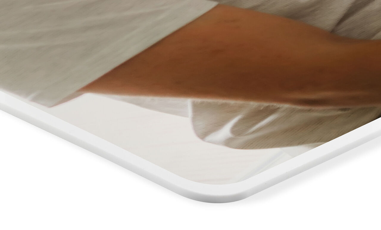 Zoom sur le bord arrondi d'un set de table personnalisé CEWE