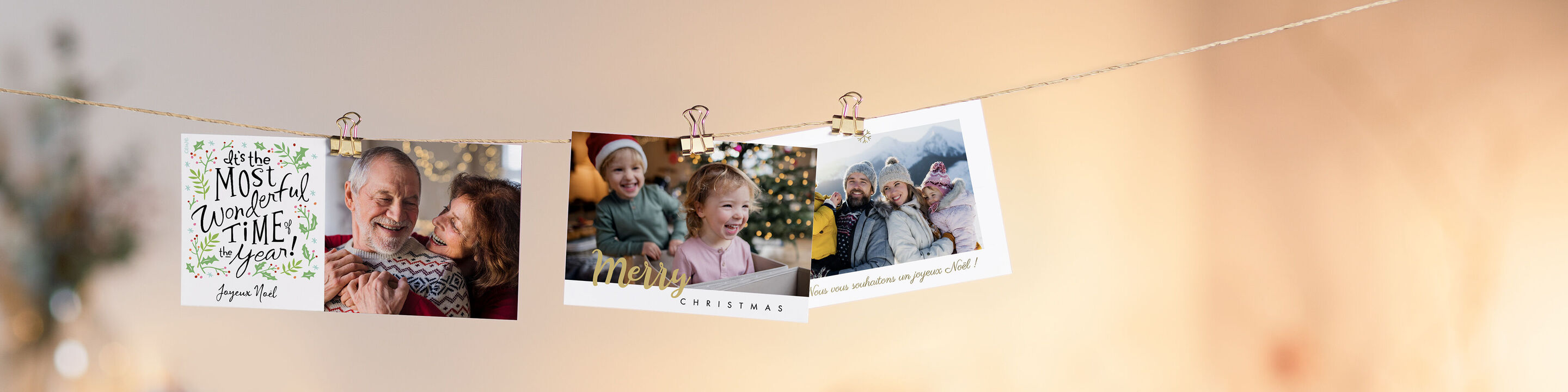Trois photos soigneusement décorées sur une corde, représentant joie et souvenirs personnels.