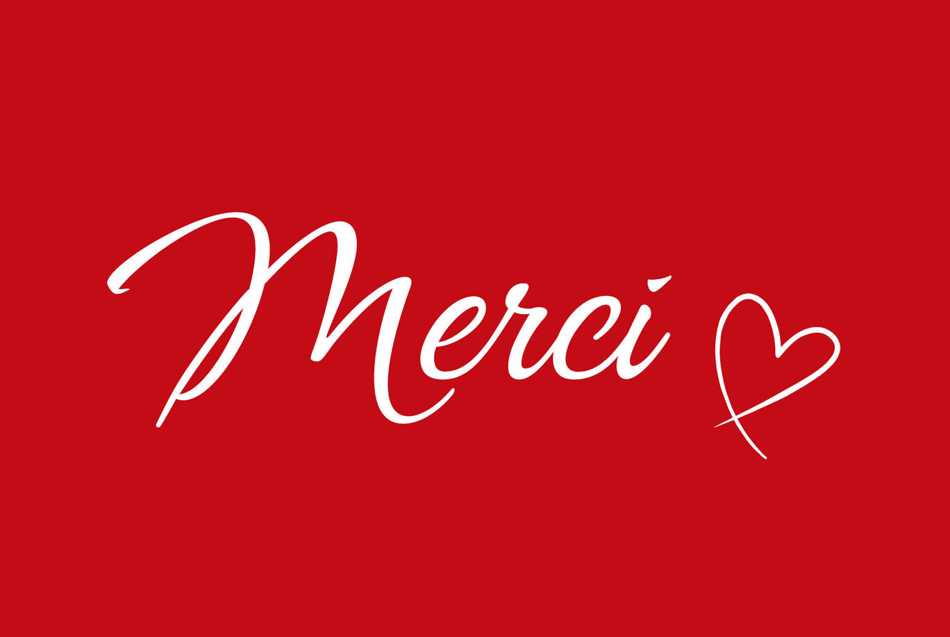 Carte de remerciement rouge avec le texte Merci et un cœur.
