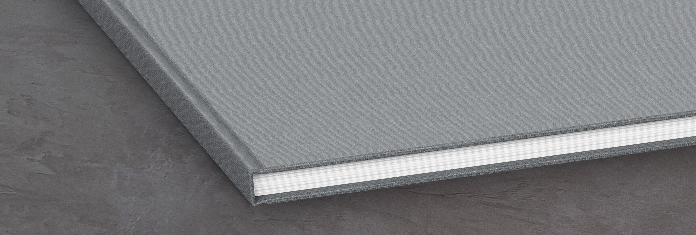 Zoom sur la couverture en lin d'un Livre Photo CEWE