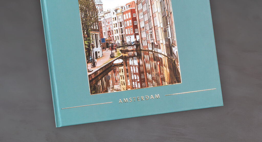 Livre photo CEWE avec une image des canaux d'Amsterdam et bâtiments historiques