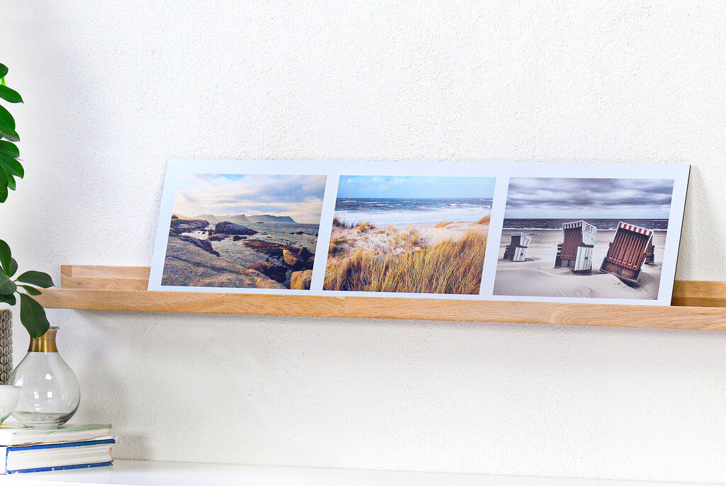 Poster pêle-mêle panoramique avec 3 photos de paysage posé sur une étagère